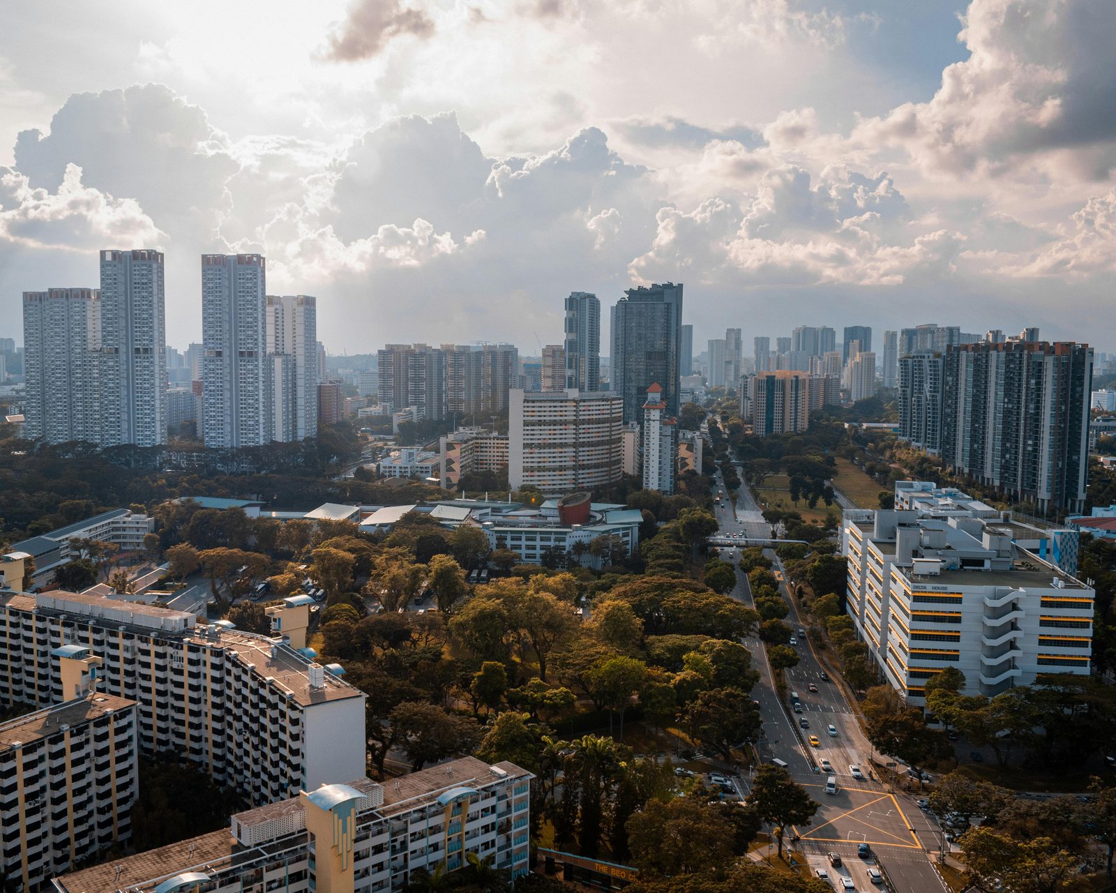 Dense Singapore public housing estate from above, illustrating a crowded agent market